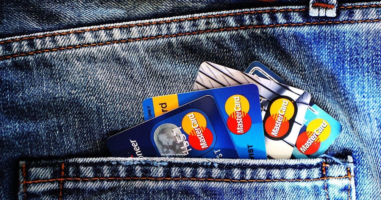 Credit cards placed on a jean back pocket