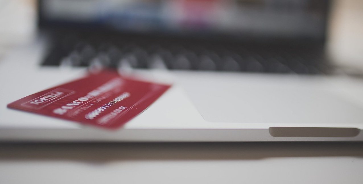 Credit card on top of a laptop