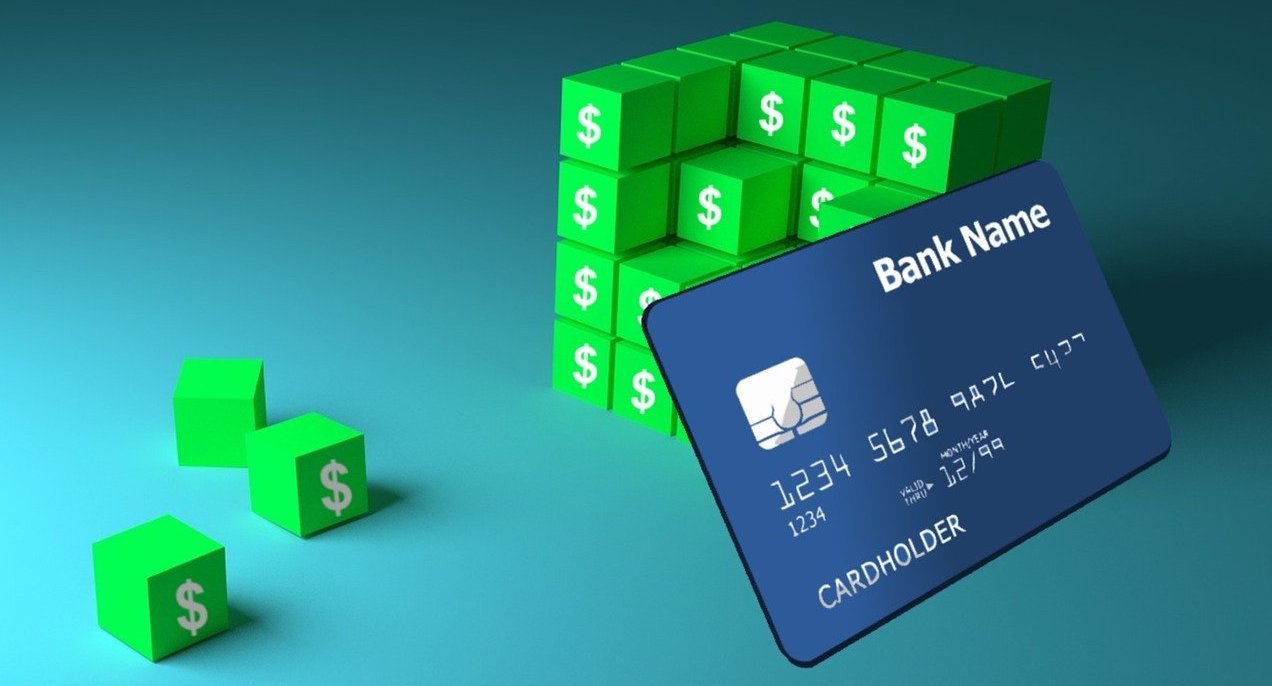 Graphic image of a credit card and blocks with dollar signs