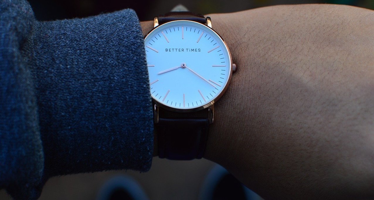 Close up of a wrist watch on a person's arm