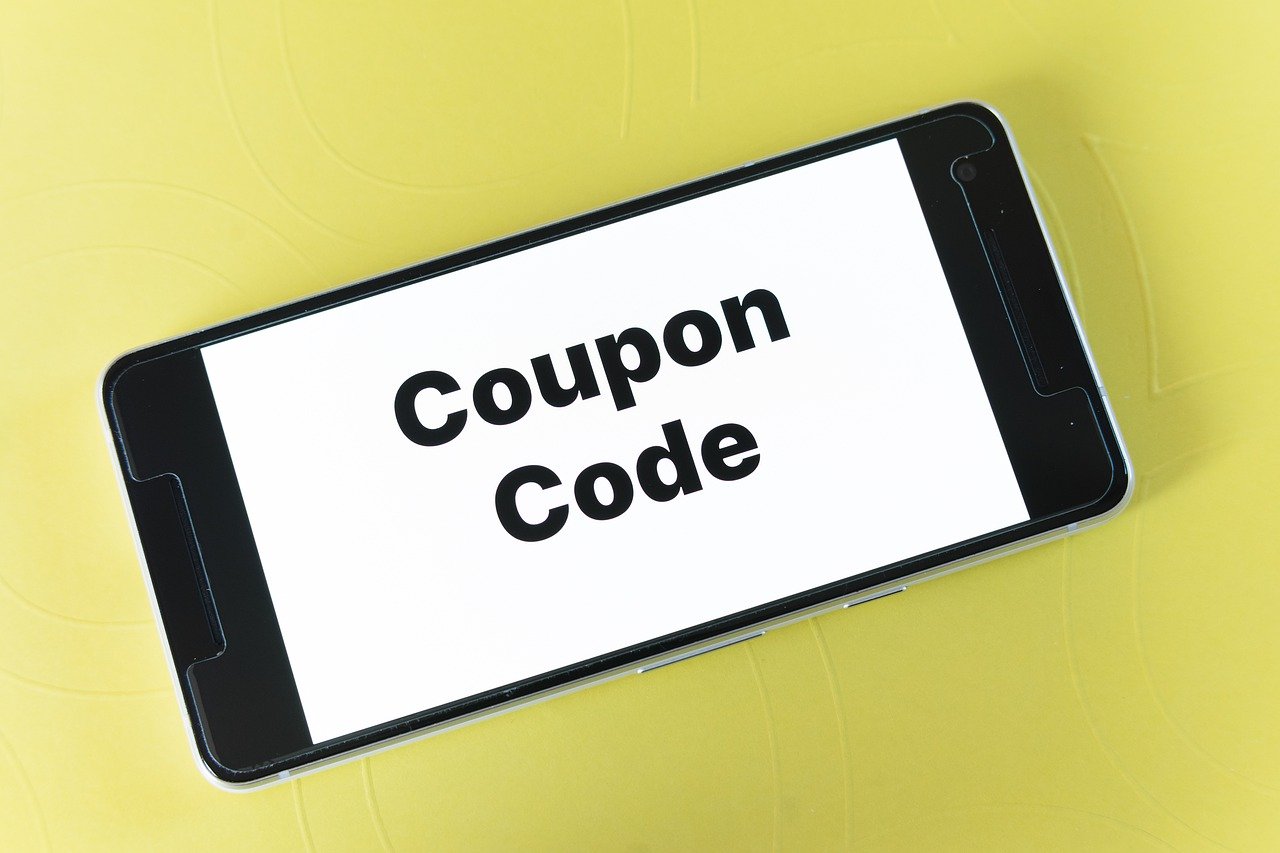 Smartphone with a banner text "Coupon Code"