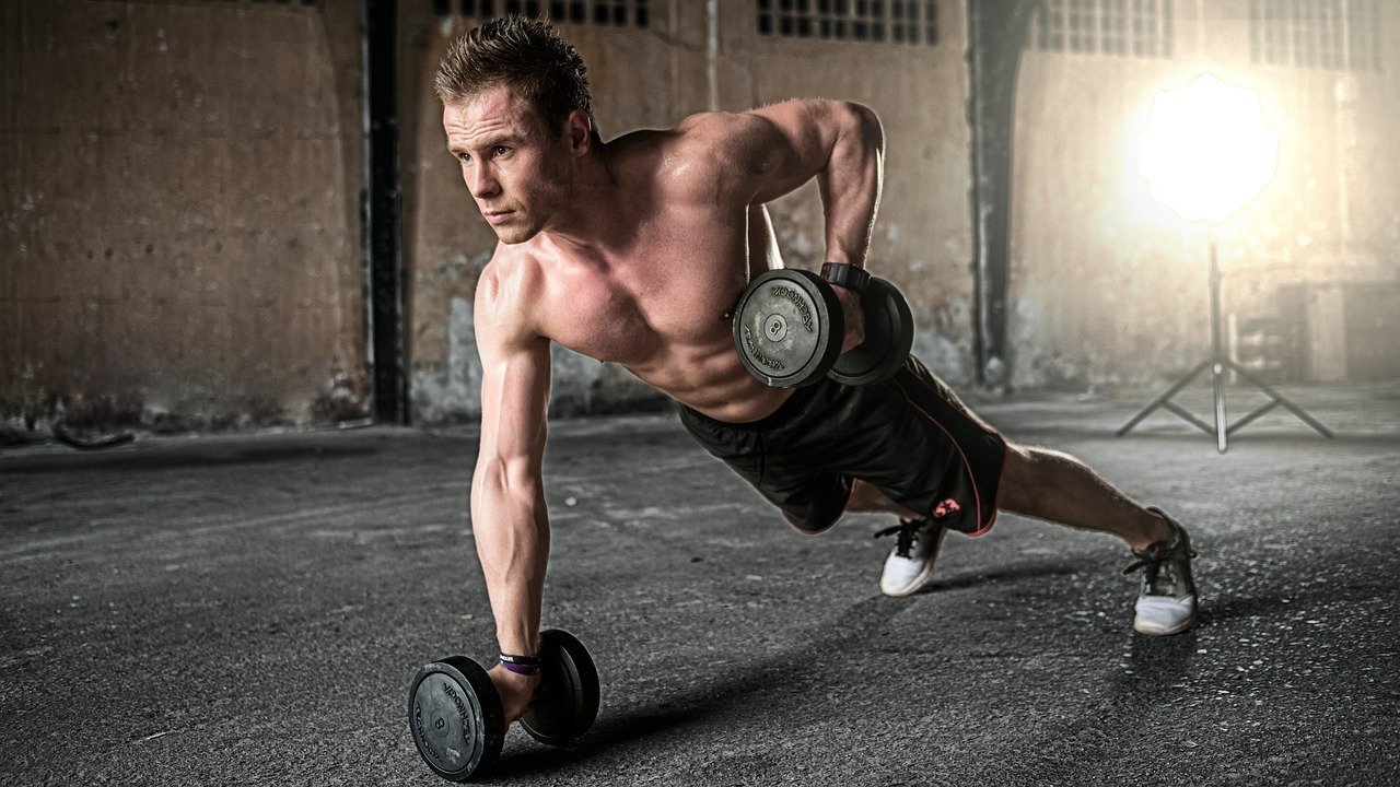 Man exercising with dumbbells