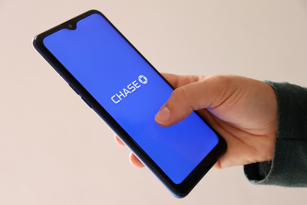 Person using their phone to access their online Chase account