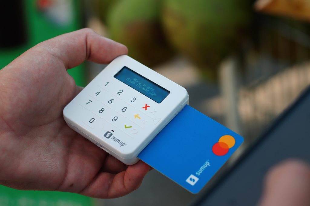 A terminal payment with credit card in its side