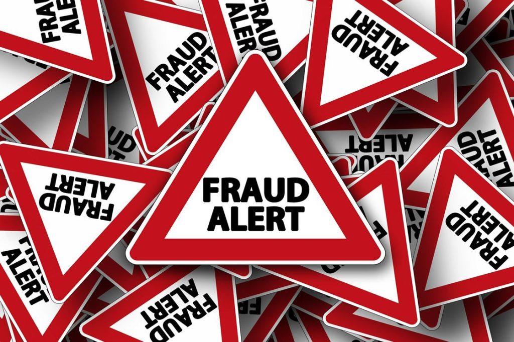 Graphic image of multiple Fraud Alert signs