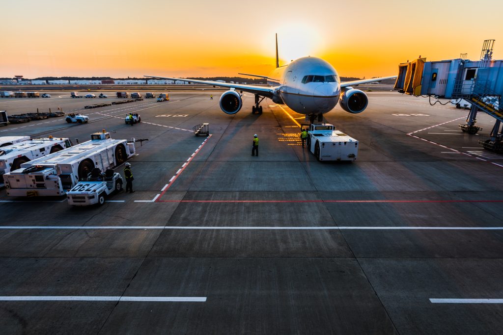 An airplane parked on the airport