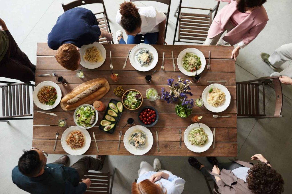 Family enjoying a meal on the table