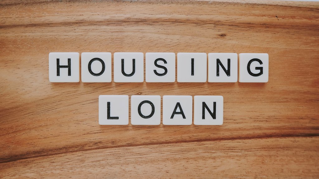 Housing Loan spelled with a scrabble tile