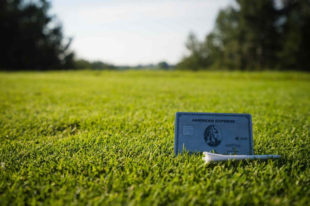 An American Express card on a grass