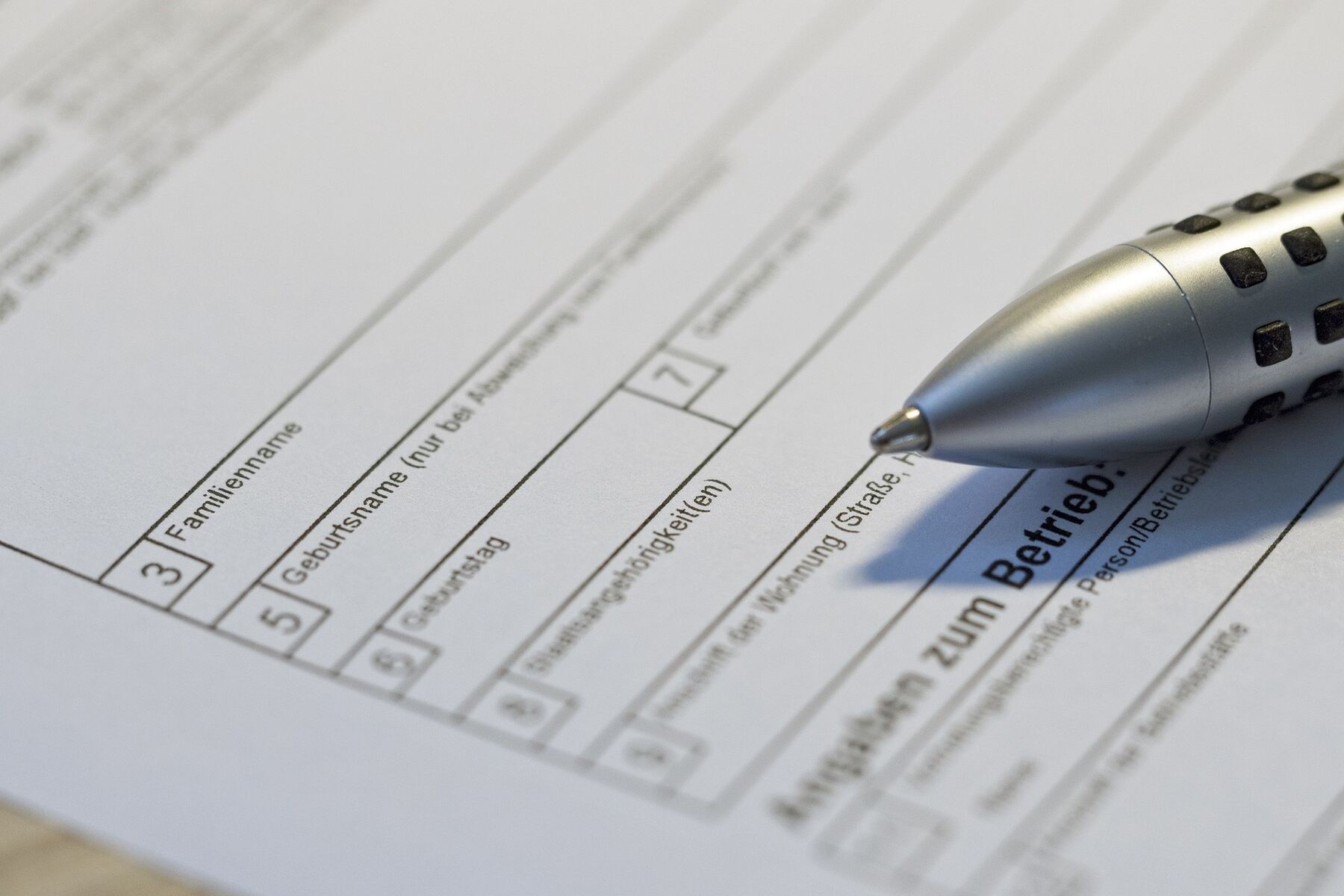 Pen on top of a printed document