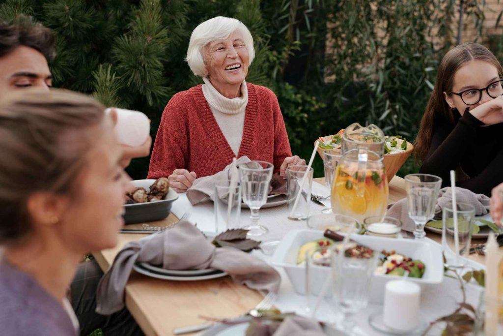 A family happily eating together in a restaurant