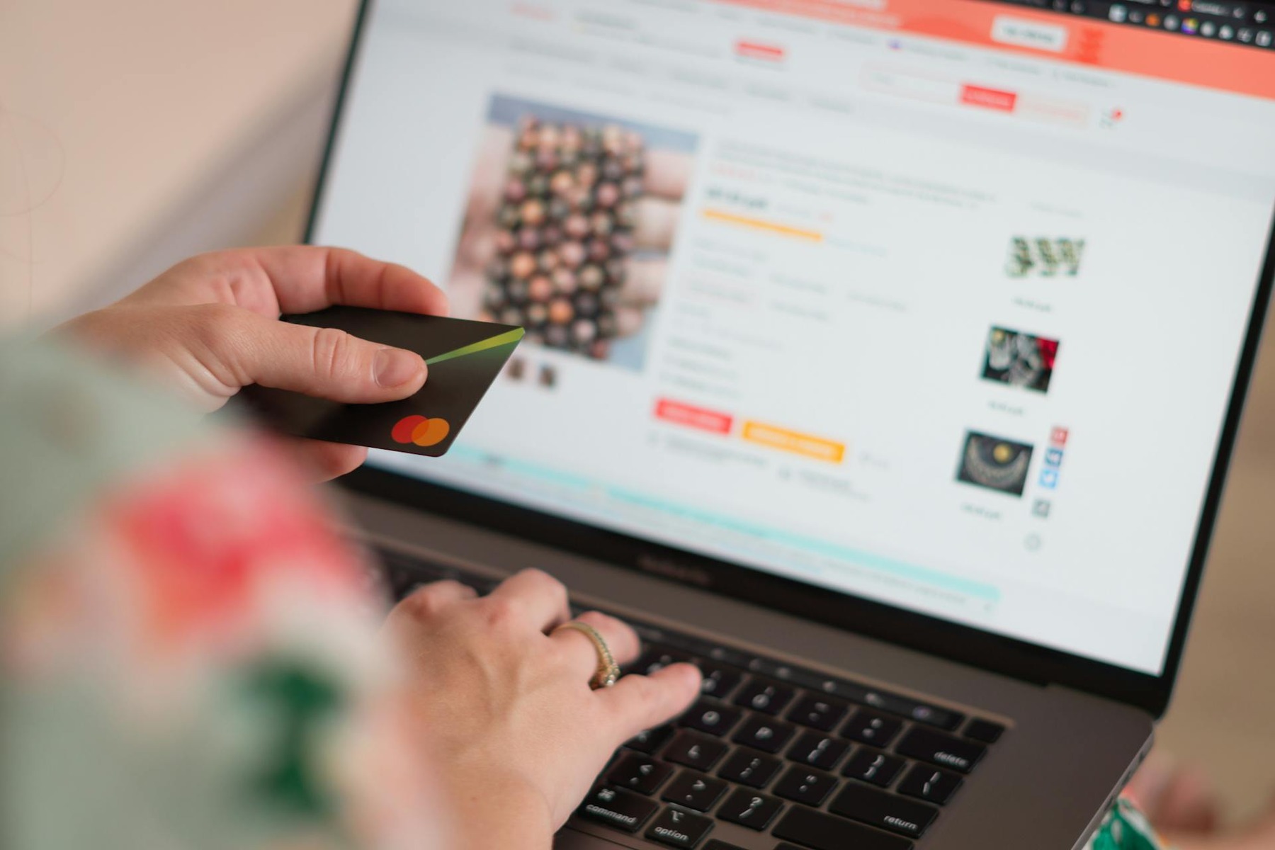 A woman browsing online stores on her laptop, searching for products